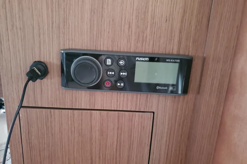 Slide: The Image of Fusion MS-RA70N stereo system on 2021 Beneteau Flyer 10 boat interior. - 19