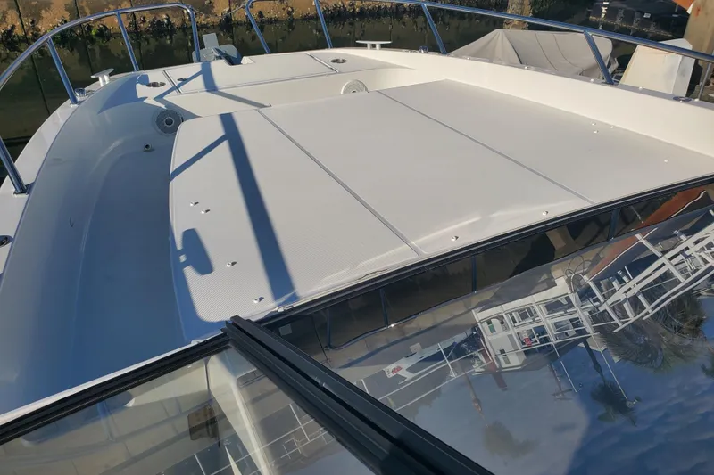 Slide: The Image of 2021 Beneteau Flyer 10 boat deck with sleek design and spacious layout. - 20