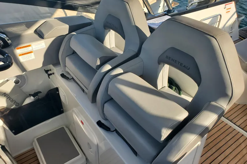 Slide: The Image of 2021 Beneteau Flyer 10 cockpit with dual seats and modern design. - 6