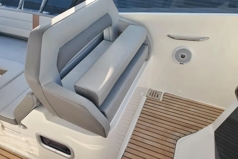 Slide: The Image of Luxury seating on 2021 Beneteau Flyer 10 boat with teak flooring. - 7