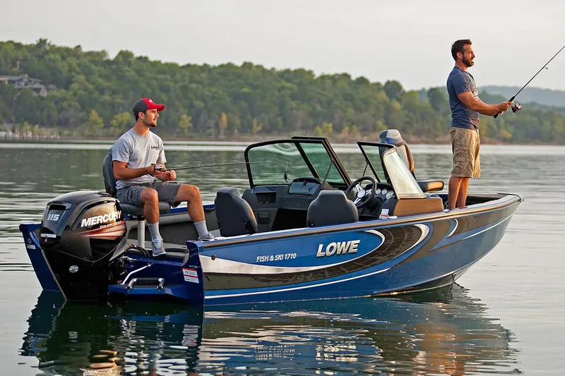 Slide: The Image of Manufacturer Provided Image: 2017 Lowe Fish & Ski FS1710 boat on a lake with two men fishing. - 19