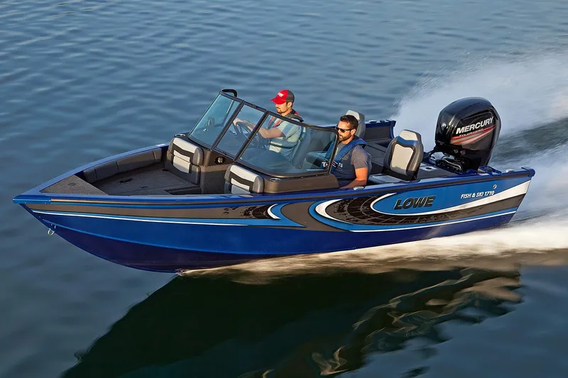 Slide: The Image of Manufacturer Provided Image: 2017 Lowe Fish & Ski FS1710 boat cruising on water with Mercury outboard motor. - 20