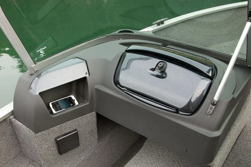 Slide: The Image of Manufacturer Provided Image: 2017 Lowe Fish & Ski FS1710 boat dashboard with storage compartments and smartphone holder. - 23