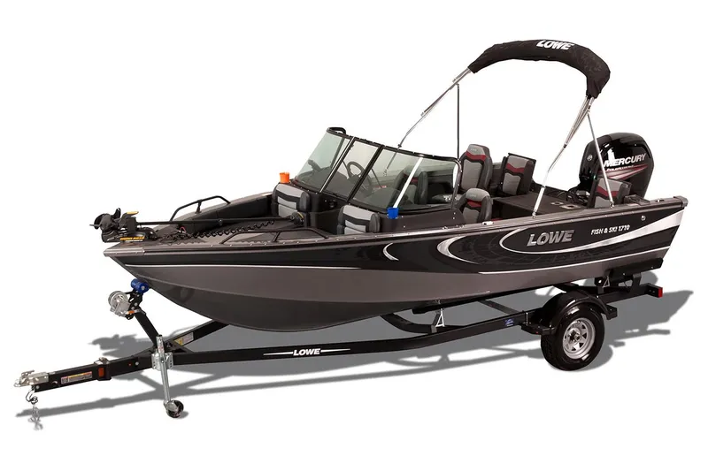 Slide: The Image of Manufacturer Provided Image: 2017 Lowe Fish & Ski FS1710 boat on trailer with bimini top and Mercury outboard motor. - 26