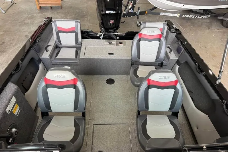 Slide: The Image of 2017 Lowe Fish & Ski 1710 boat interior with four seats, gray and red design. - 6