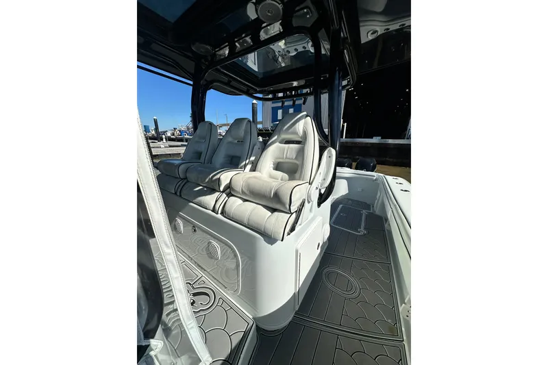 Slide: The Image of 2016 Yellowfin 42 Offshore boat interior with luxurious seating and sleek design. - 38
