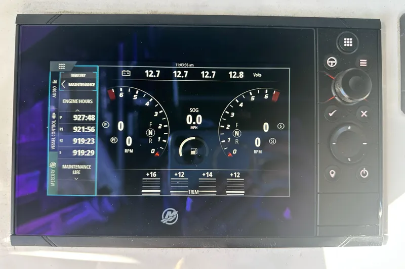 Slide: The Image of Dashboard display of a 2016 Yellowfin 42 Offshore boat showing engine metrics and controls. - 46