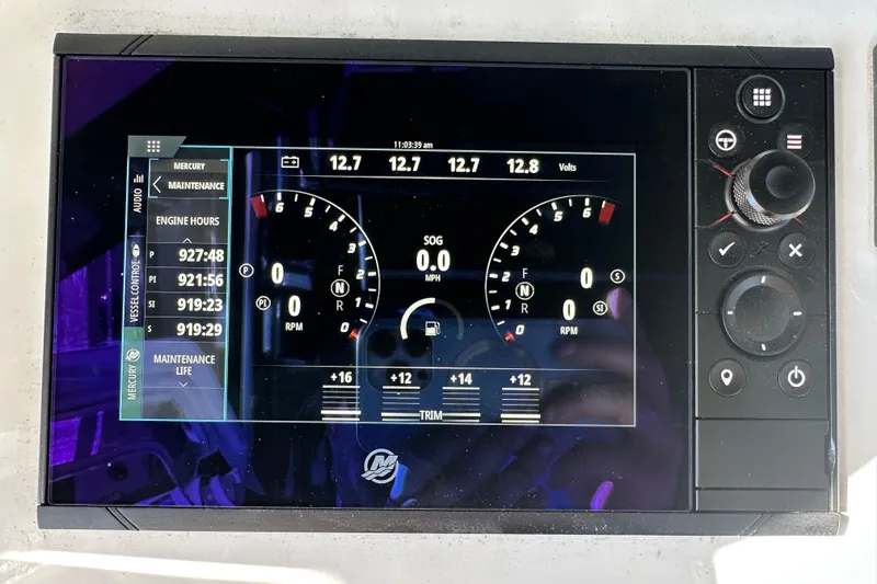 Slide: The Image of Dashboard display of a 2016 Yellowfin 42 Offshore boat showing engine metrics. - 47