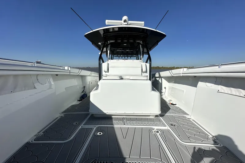 Slide: The Image of 2016 Yellowfin 42 Offshore boat interior with sleek design and spacious deck. - 53