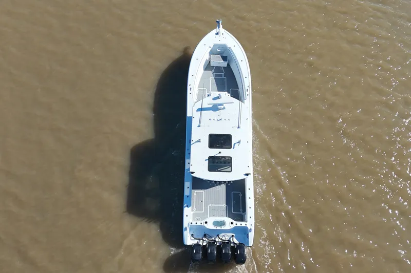 Slide: The Image of Overhead view of 2016 Yellowfin 42 Offshore boat on water. - 9