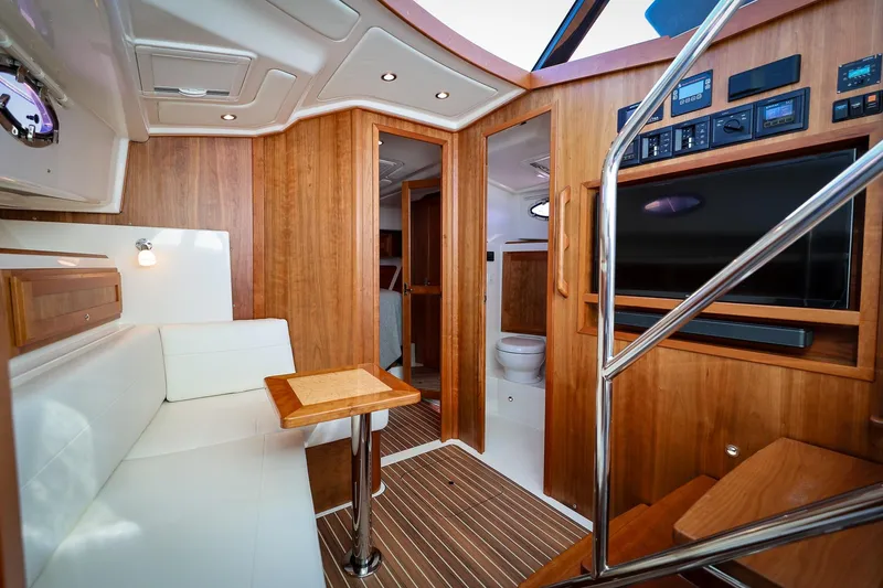 Slide: The Image of Lower lounge seating area, 2024 Back Cove 39O - 13