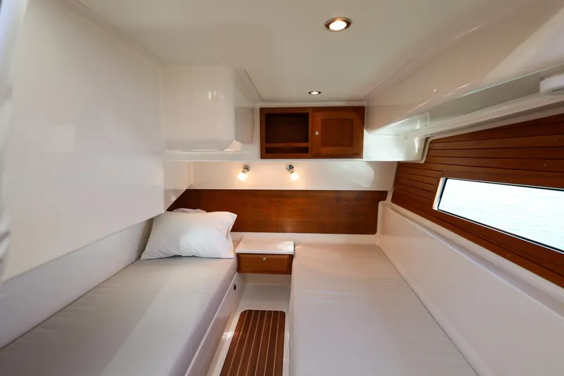 Slide: The Image of 2024 Back Cove 39O Twin bed guest cabin, just aft of lower lounge area - 14