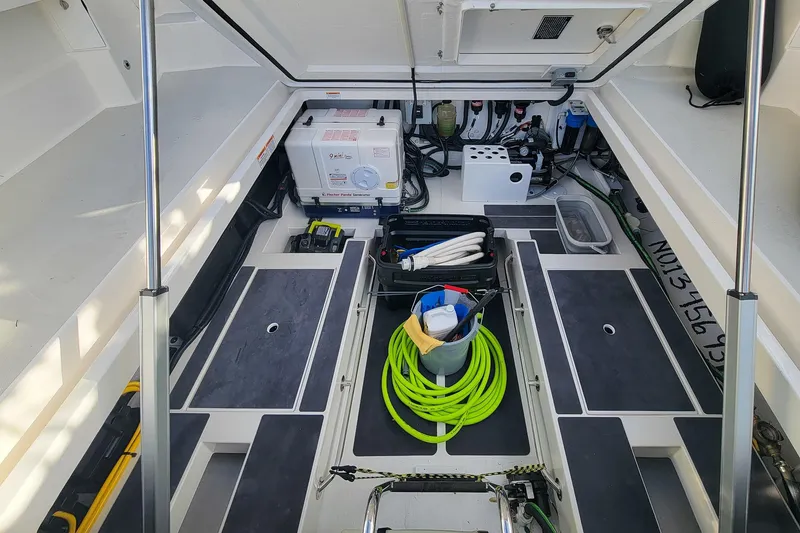 Slide: The Image of 2024 Back Cove 39O cockpit storage bay - 31