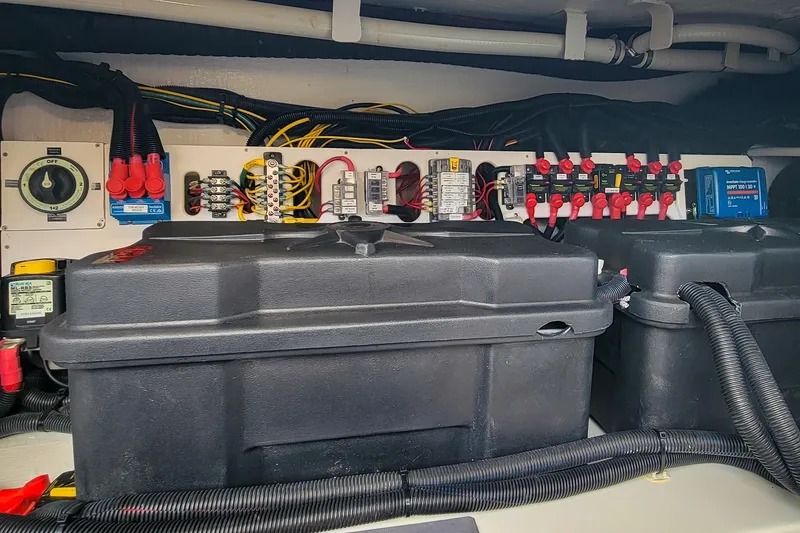 Slide: The Image of Electrical system of 2024 Back Cove 39O boat, featuring batteries and wiring components. - 35