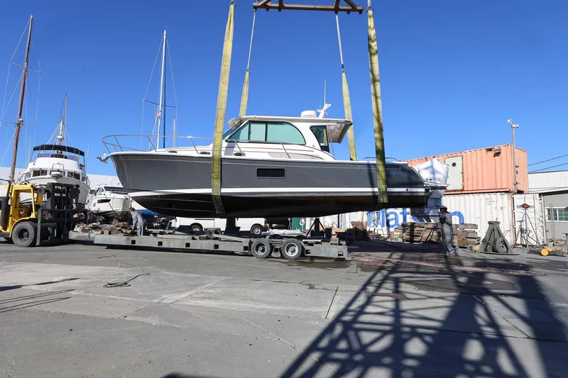 Slide: The Image of 2024 Back Cove 39O boat being lifted at a shipyard - 42