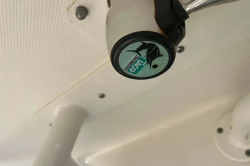 Slide: The Image of Close-up of a 2015 Century 2901 Center Console boat's fishing rod holder. - 11