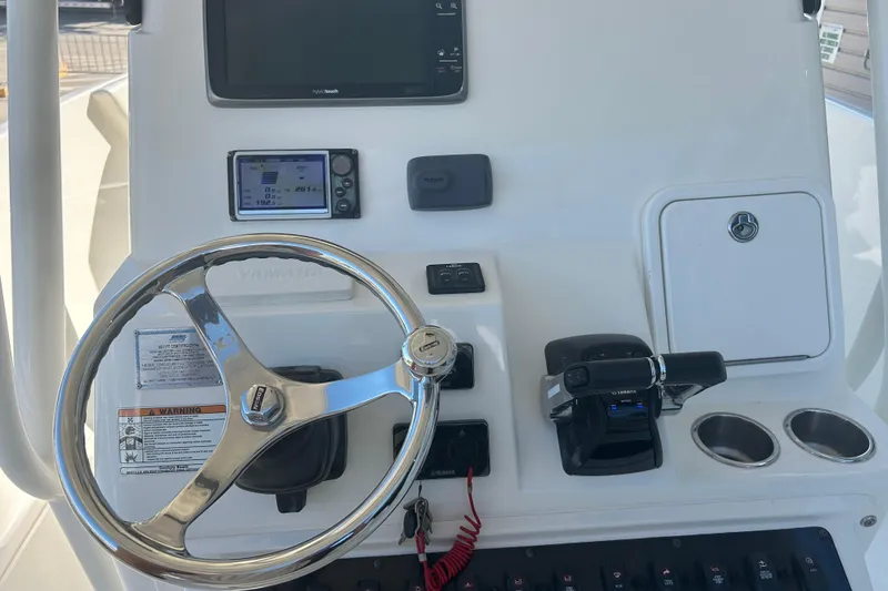 Slide: The Image of Century 2901 Center Console 2015 dashboard with steering wheel and controls. - 17