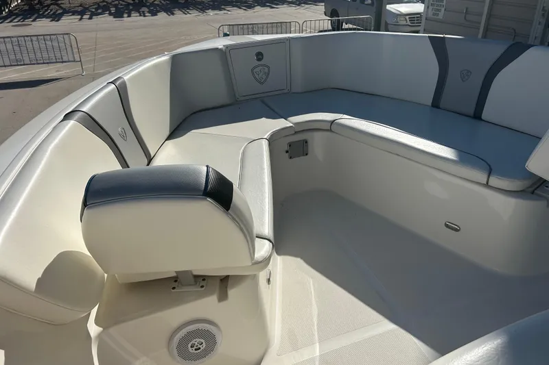 Slide: The Image of 2015 Century 2901 Center Console boat interior with cushioned seating and speaker. - 23