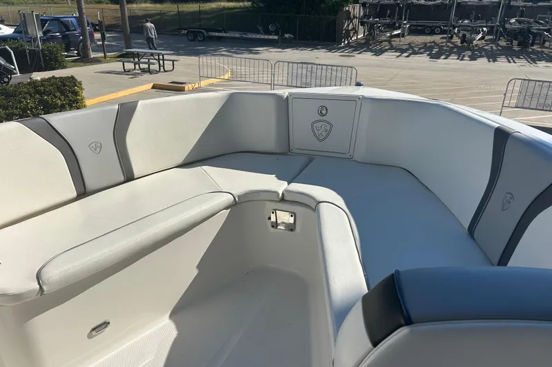Slide: The Image of 2015 Century 2901 Center Console boat with spacious seating area and sleek design. - 25