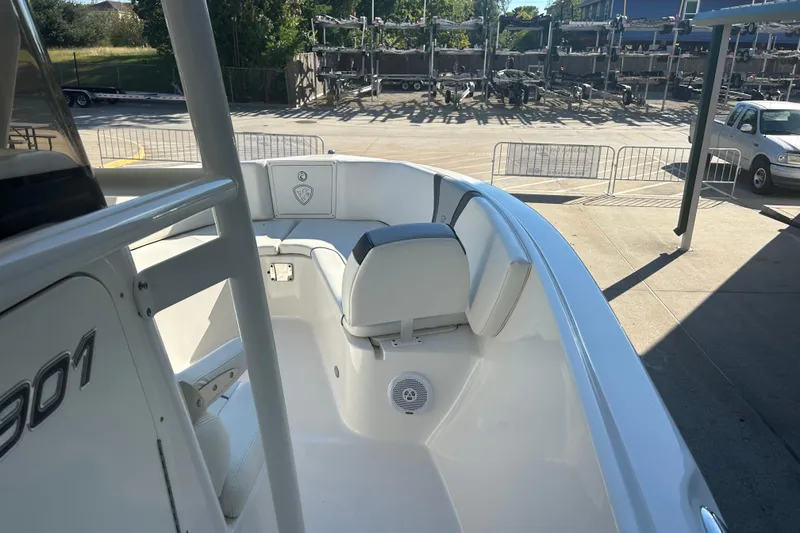 Slide: The Image of 2015 Century 2901 Center Console boat interior with seating and speaker. - 30