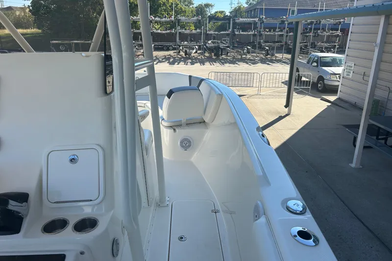 Slide: The Image of 2015 Century 2901 Center Console boat interior at a marina. - 31