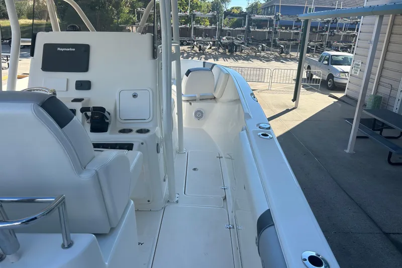 Slide: The Image of 2015 Century 2901 Center Console boat interior with seating and control panel. - 32