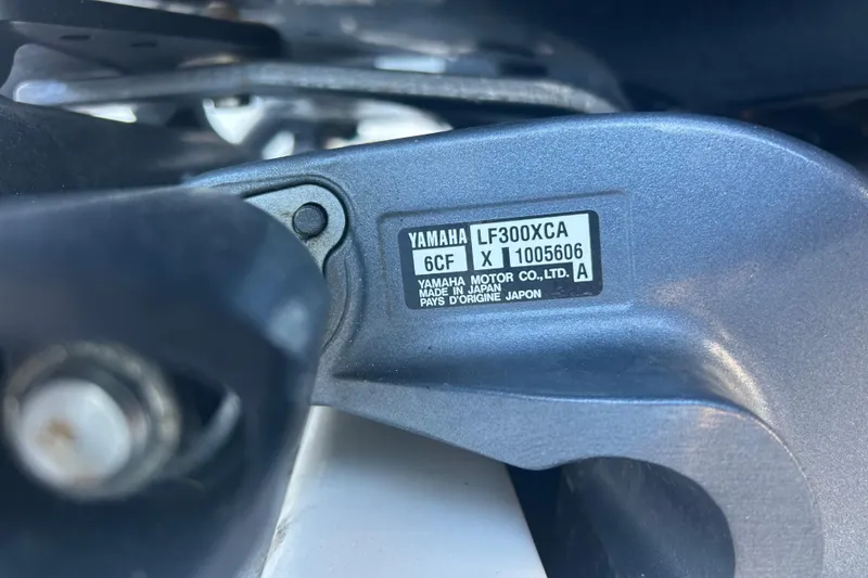 Slide: The Image of Close-up of Yamaha LF300XCA engine label on 2015 Century 2901 Center Console boat. - 46