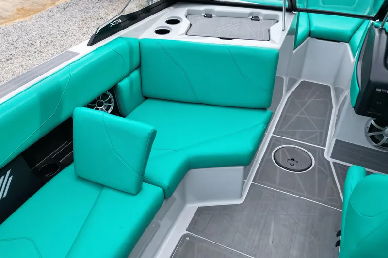 Slide: The Image of 2021 ATX Surf Boats 20 Type-S interior with teal seating and modern design. - 12