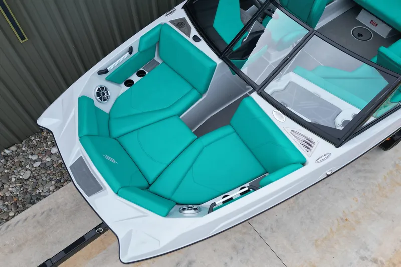 Slide: The Image of 2021 ATX Surf Boats 20 Type-S with teal seating and sleek design. - 8