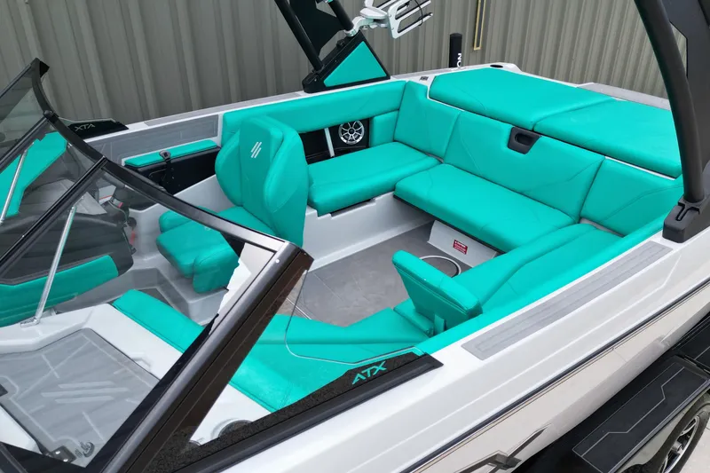 Slide: The Image of 2021 ATX Surf Boats 20 Type-S interior with turquoise seating and modern design. - 9