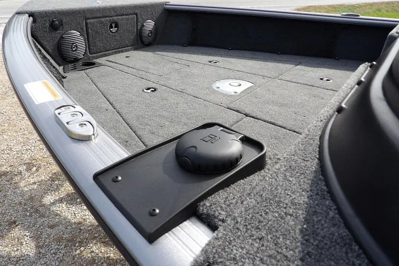 Slide: The Image of 2026 Lund 1875 Impact XS Sport boat on trailer, parked outdoors. - 12