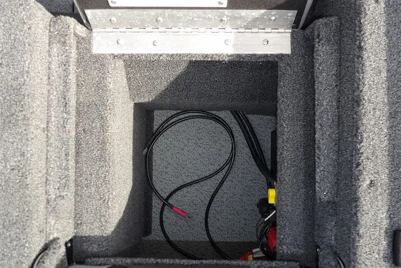 Slide: The Image of 2026 Lund 1875 Impact XS Sport boat interior with four seats and steering console. - 21