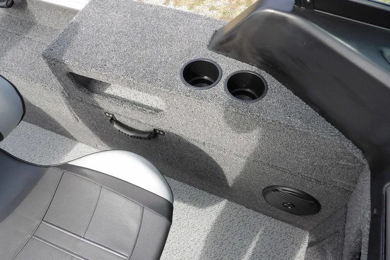 Slide: The Image of 2026 Lund 1875 Impact XS Sport boat interior with open storage compartment. - 36