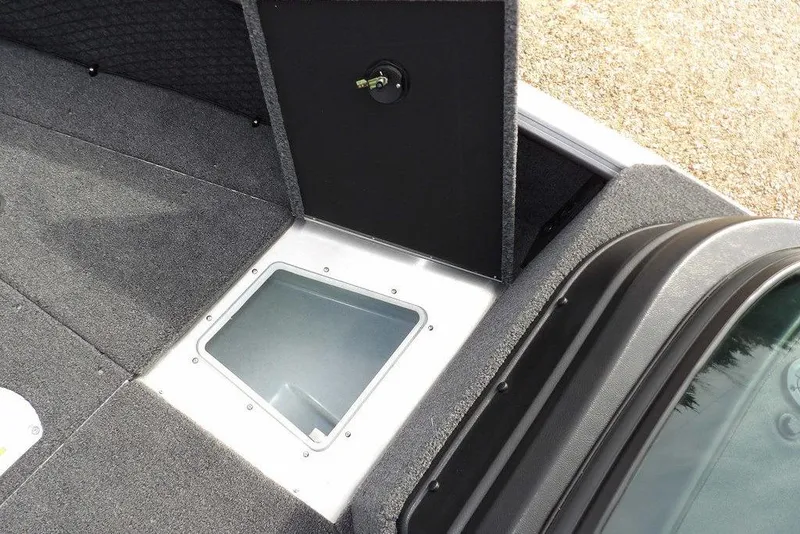 Slide: The Image of Open storage compartment on 2026 Lund 1875 Impact XS Sport boat. - 39