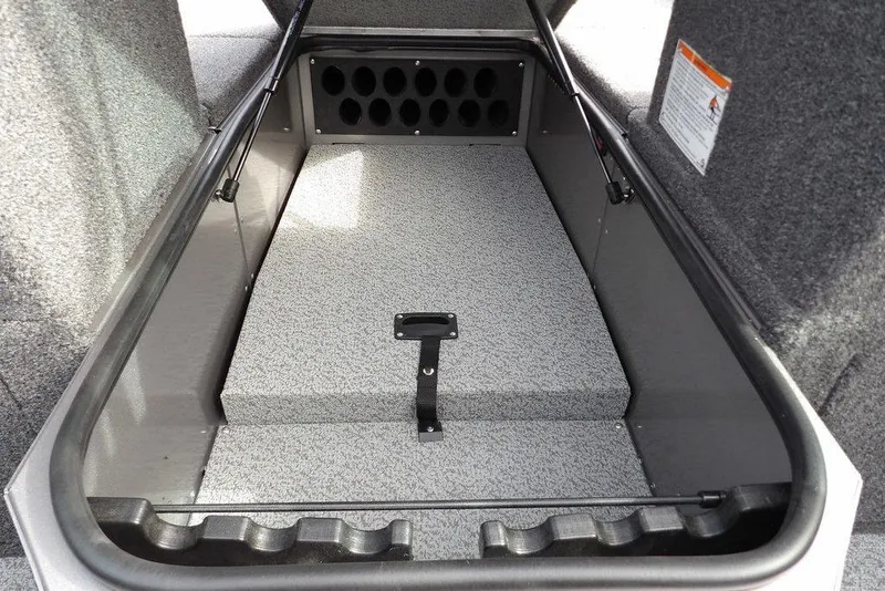 Slide: The Image of 2026 Lund 1875 Impact XS Sport boat on trailer outside marine center. - 44