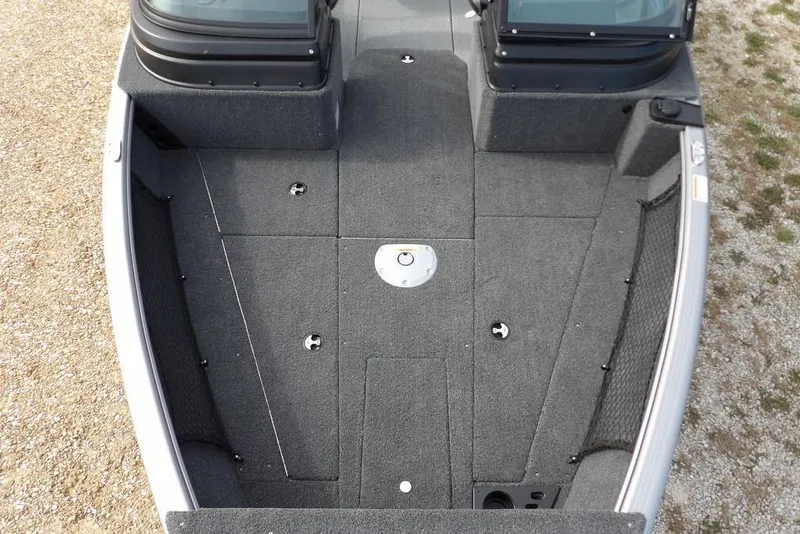 Slide: The Image of 2026 Lund 1875 Impact XS Sport boat on trailer, rear view, parked on gravel. - 48