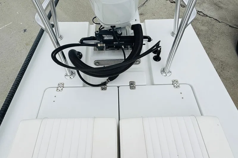 Slide: The Image of 2021 Beavertail Skiffs 18 Mosquito boat deck with motor and seating. - 12