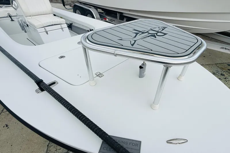 Slide: The Image of 2021 Beavertail Skiffs 18 Mosquito boat deck with seating and custom table. - 4