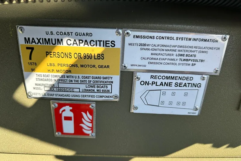 Slide: The Image of 2026 Lowe Roughneck 1860SC capacity and emissions labels, U.S. Coast Guard compliance, seating diagram. - 25