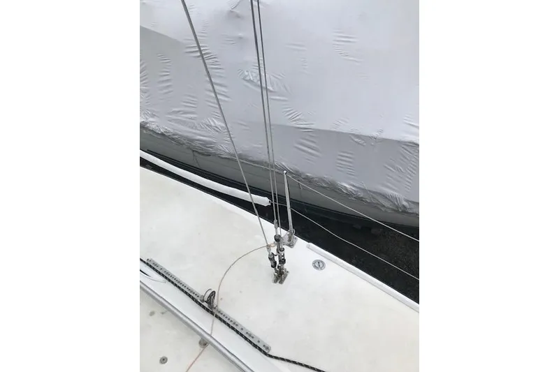 Slide: The Image of Deck view of a 1997 JBoat J 105 sailboat with rigging details. - 11