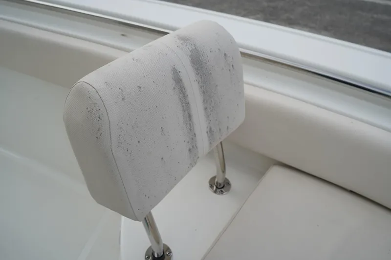 Slide: The Image of Dirty boat seat on 2022 Sea Hunt Ultra 229, showing wear and tear. - 30