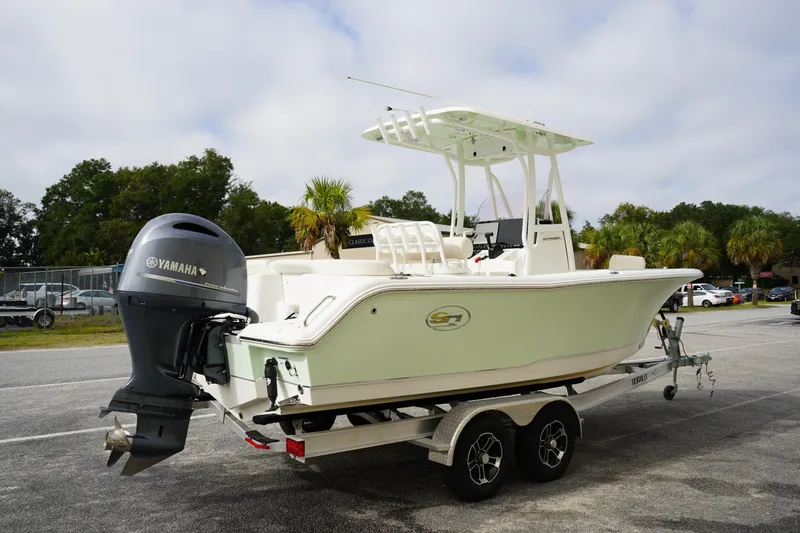 Slide: The Image of 2022 Sea Hunt Ultra 229 boat on trailer with Yamaha outboard motor. - 5