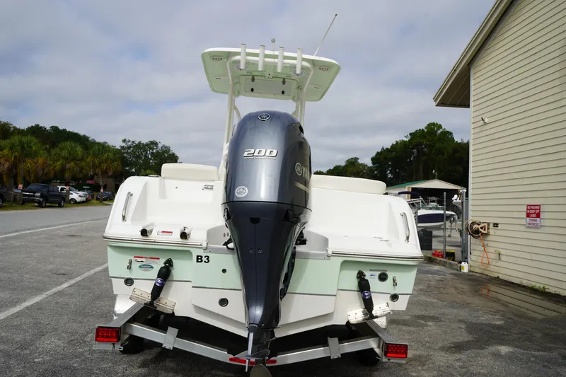 Slide: The Image of 2022 Sea Hunt Ultra 229 boat with Yamaha 200 engine on trailer. - 6