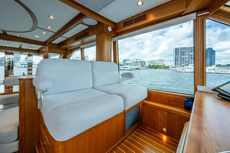 Slide: The Image of Luxurious interior of 2022 Sabre 58 Salon Express yacht with waterfront view. - 12