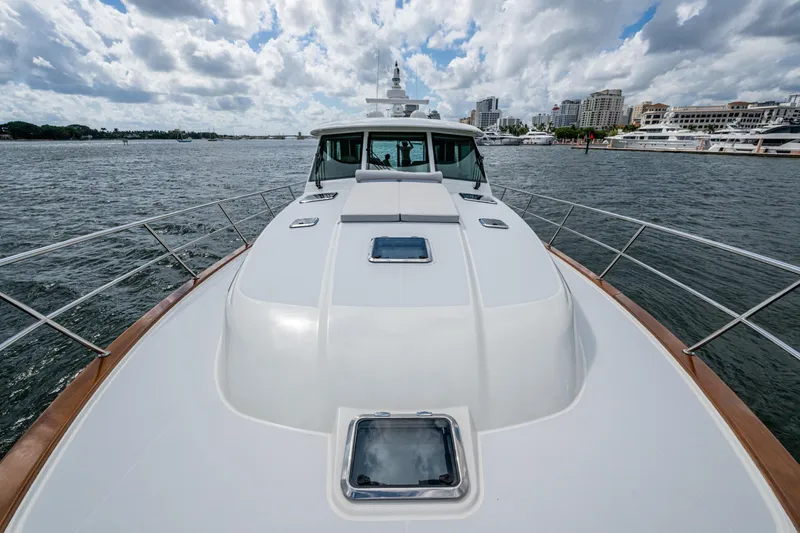 Slide: The Image of 2022 Sabre 58 Salon Express yacht on water, showcasing sleek design and luxury features. - 38