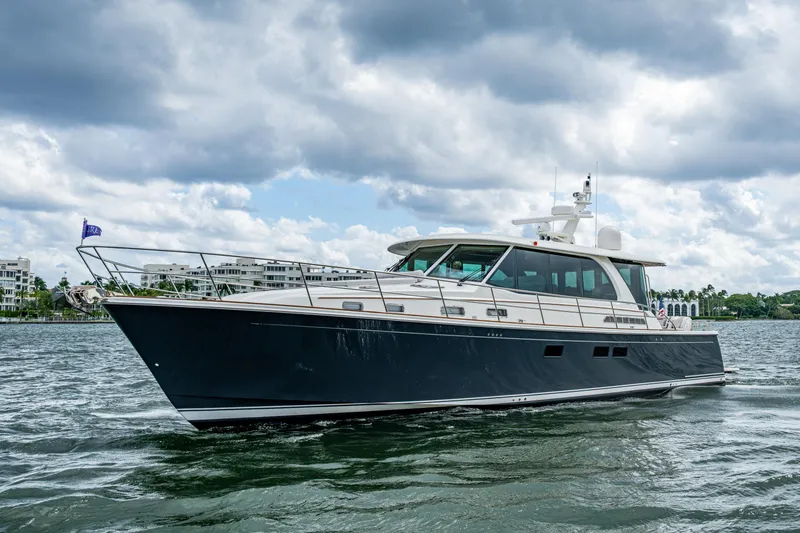 Slide: The Image of 2022 Sabre 58 Salon Express yacht cruising on a cloudy day. - 43