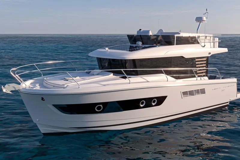 Slide: The Image of 2026 Beneteau Swift Trawler 37 Fly cruising on open water, showcasing sleek design and modern features. - 2