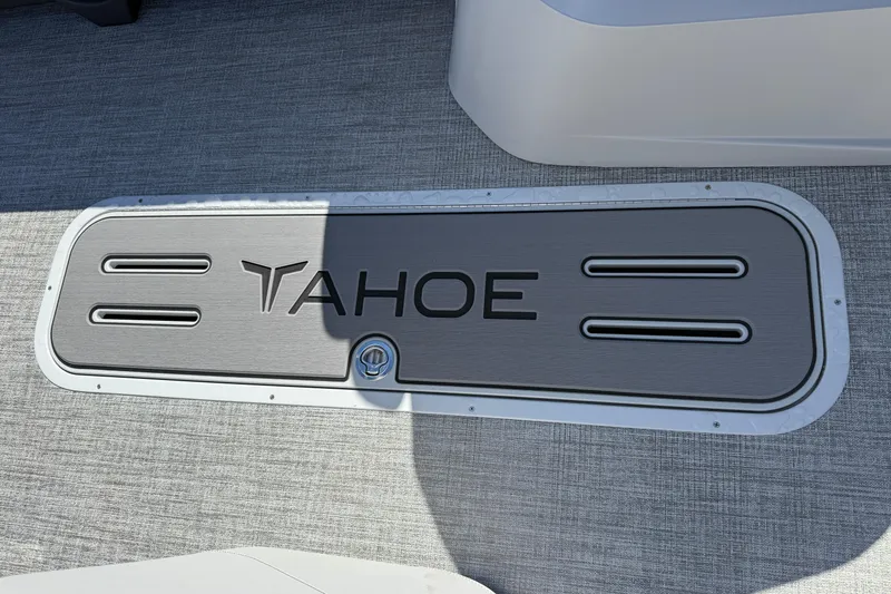 Slide: The Image of 2026 Tahoe Pontoon LTZ Entertainer deck with logo, featuring sleek design and modern finish. - 12