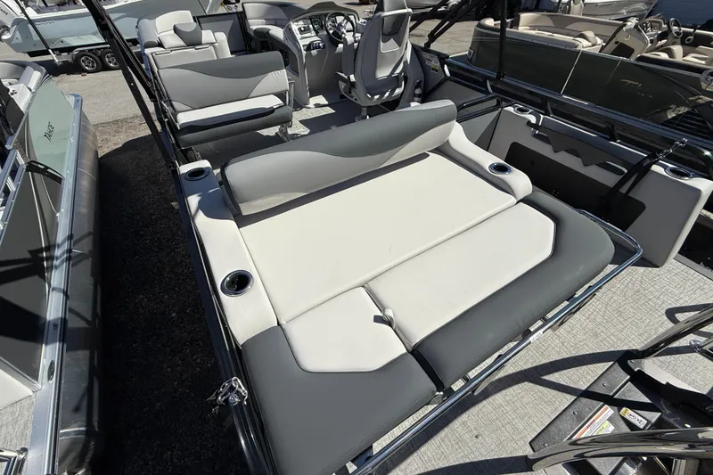 Slide: The Image of 2026 Tahoe Pontoon LTZ Entertainer with luxurious seating and modern design. - 2