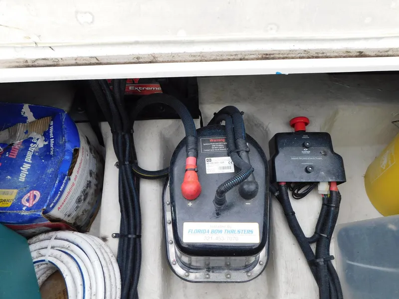 Slide: The Image of Electrical components in a 2003 Carver 444 Cockpit Motor Yacht, featuring wiring and equipment. - 5